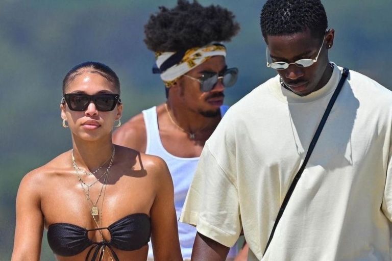Fashion Bomb Couple: Lori Harvey Wore a Black Melissa Simone Bikini with an Abstract Hermes Cover-Up with Beau Damson Idris
