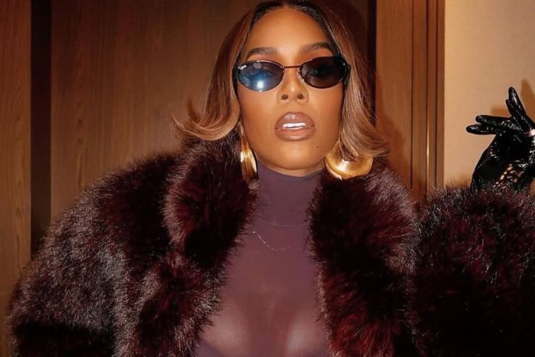 Kelly Rowland Wore a Burgundy ‘Sons of Gemini’ Dress and a $1,490 Retrofete Faux Fur Coat to Broadway