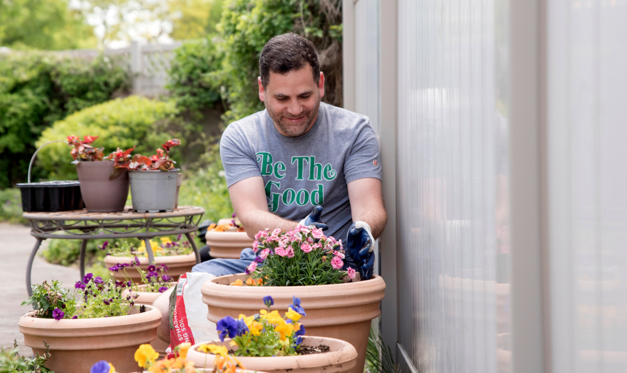 volunteer planting flowers